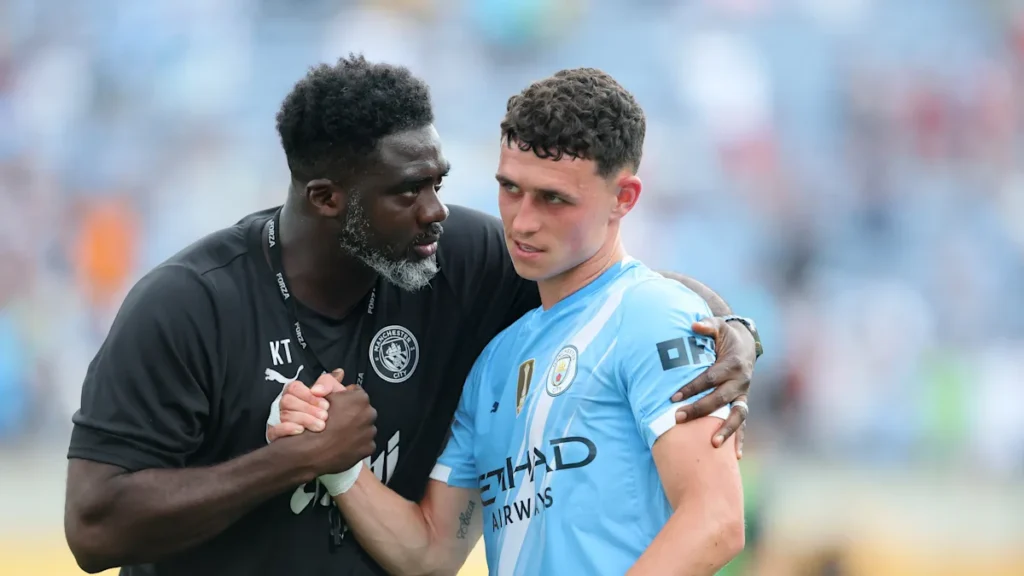 Kolo Toure and Phil Foden