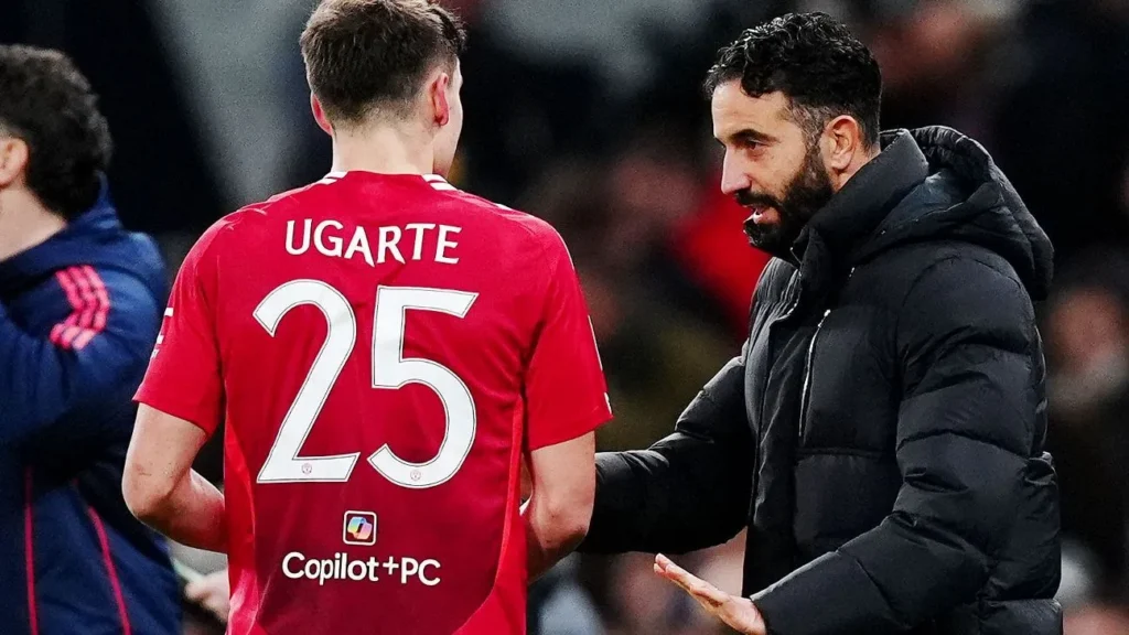 Ruben Amorim (right) giving Ugarte (left) instruction